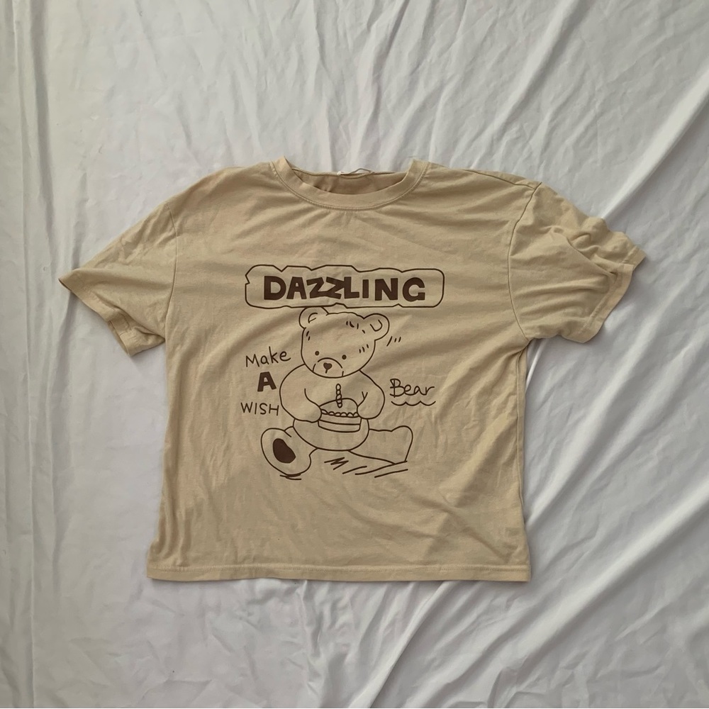 A tan graphic tee